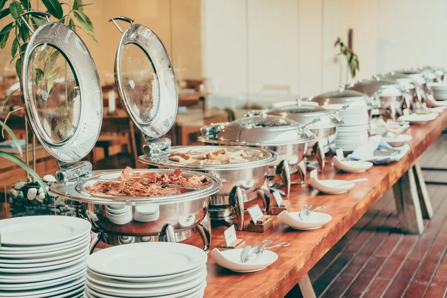 Buffet table at a corporate Eid ul Adha event showing professional food service in the UK.